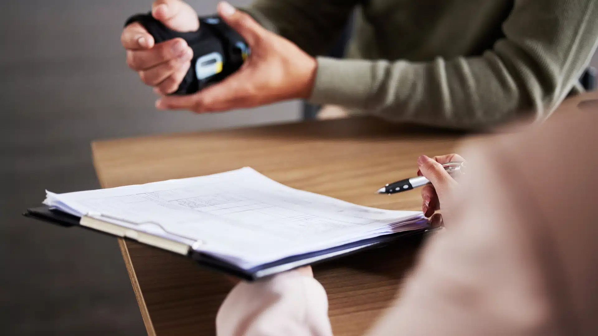 Injury lawyer reviewing documents with client