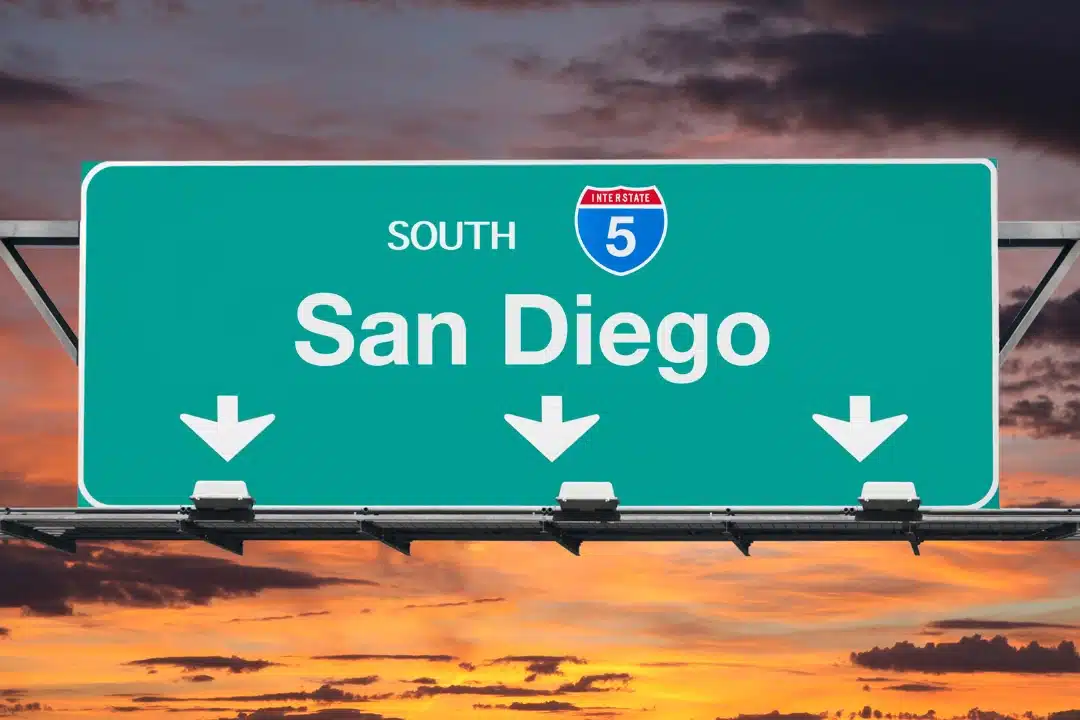 View of San Diego city with skyline, coastal landscape, and local landmarks.