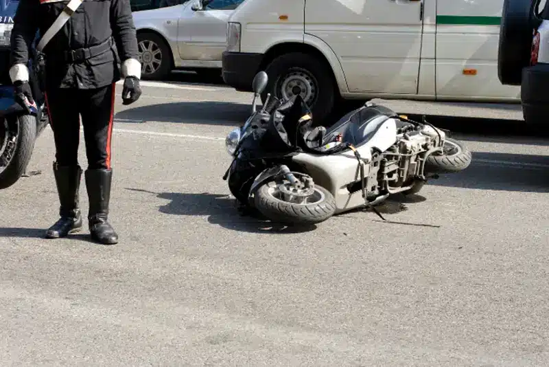 Motorcycle accident lawyer in California meeting with injured rider about freeway crash case.